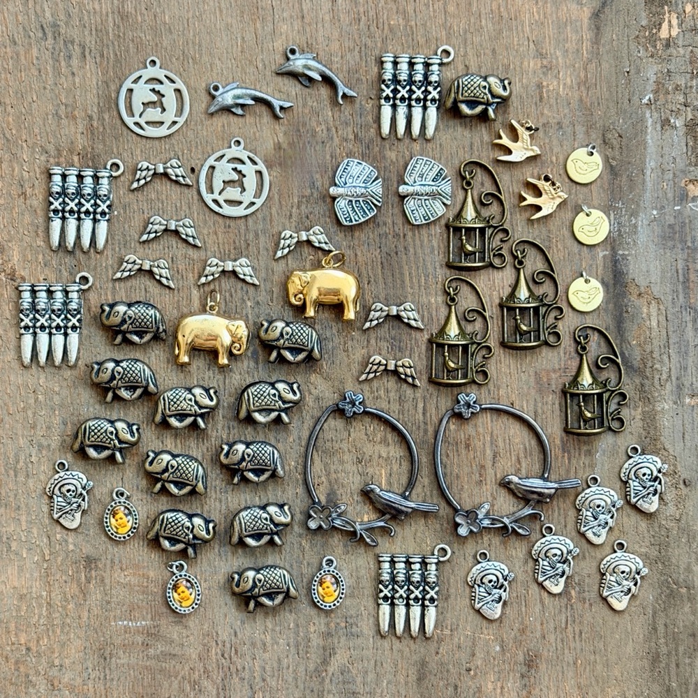 Assorted vintage Animal and Decorative Metal Charms